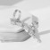 Ring "Assorted" volumetric claw, white color in silver, dimensionless