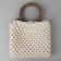 Handles for the bag are wooden, wicker, d = 10.2 / 12.5 cm, 2 pcs, brown color