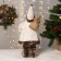 Santa Claus "in a white fur coat, in a cap, with a flashlight" moves, 40 cm