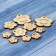 A set of tags "Hand Made", flowers, 30 mm - 6 pcs; 25 mm - 6 pcs; 15 mm - 27 pcs