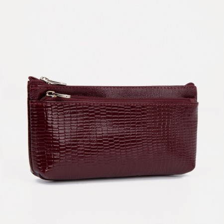 Women's wallet is a female on a zipper, burgundy color