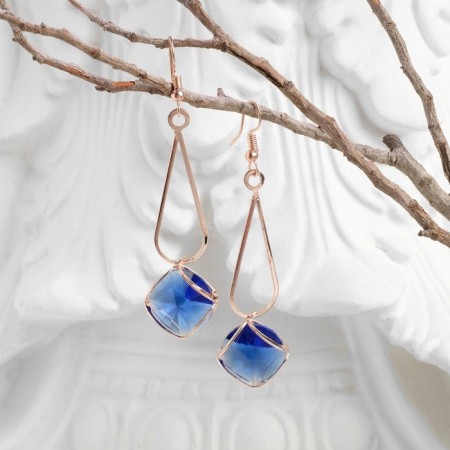 Hanging earrings with rhinestones "drop with a rhombus", the color is blue in pink gold-1