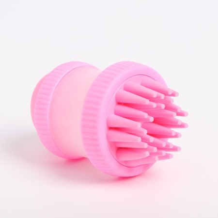 Brush for washing and massage of animals, with a shampoo container, pink