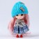 Trick "Doll" in a knitted cap, 9 cm