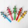 A rattle with bells "Smiley", Mix colors