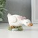 Polystone souvenir "Gusenok with a pink bow in a clearing" 12x5x5.5 cm