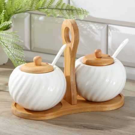 A set of ceramic cans for bulk products with spoons on an esthete wooden stand, 2 items, 300 ml