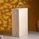 Gift box 34 × 21.5 × 10 cm is wooden, with a covering lid, with a handle