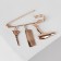 Pin with pendants "hairdresser", 5.5 cm, color pink gold