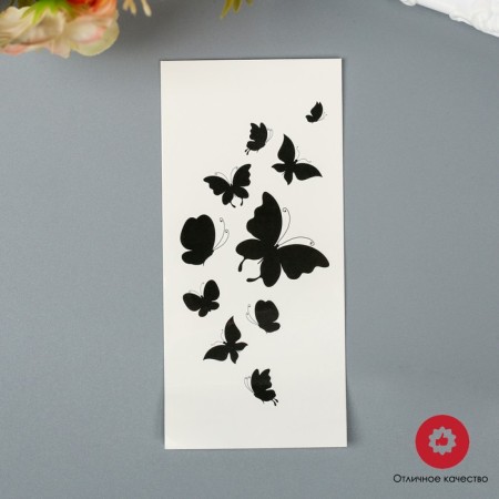 Tattoo on the body "Black butterflies"