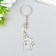Metal key "Giraffe" silver 5x2 cm