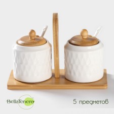 A set of porcelain cans for bulk products with spoons on the bamboo stand Bellatenero 