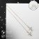 Hanging earrings with rhinestones “cross” on a chain, white color in gold, 10.3 cm
