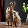 Polystone souvenir "Golden elephants with white rhinestones" set 28.5x21x8.3 cm