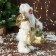 Santa Claus "with gifts and in the strap" 31 cm, white-gold