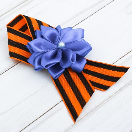 Icon with tape and blue flower on Victory Day "May 9"-2