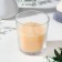 Candle in a smooth glass flavored "sandalwood", 8.5 cm