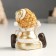 Souvenir Polystone "Baby in a gold caftan and cap, sits" mix 4x5x8 cm