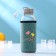 A glass bottle in the case “Bow”, 300 ml, h = 16.5 cm, color mix