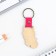 A wooden key keychain "Believe in miracles", 7 x 3.7 cm