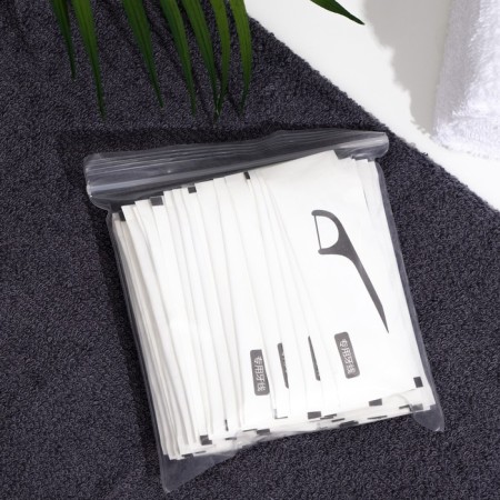 Tooth thread in a plastic holder, individual packaging, set of 50 pcs.