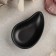 Black East sauce, 10 × 6.6 × 2.5 cm, black color