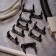 Fastener-clip for the mounting gun Ø 50 mm, black (25 pcs/UP) rexant