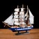 The ship souvenir medium “Corsica”, the sides are blue with a white strip, white sails, 43x8.5x37 cm