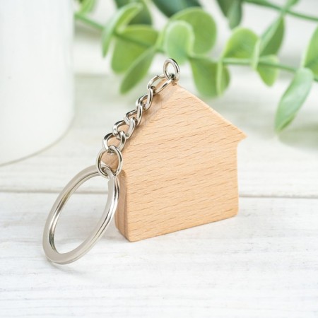 The keychain "Happy is the one who is happy at home", 4.1x4 cm, BU-1