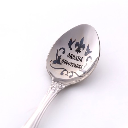 A spoon is registered, tea, with an engraving "Oksana", h = 14-2