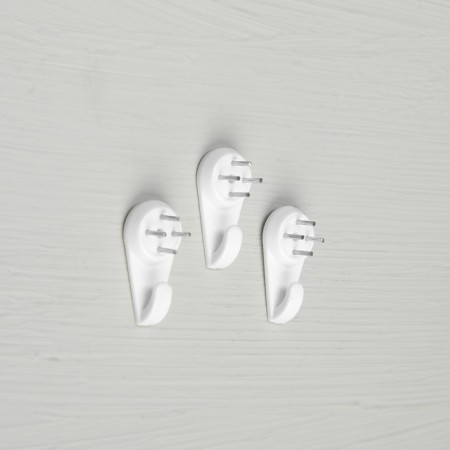 The hook for the picture is plastic, medium white, 3 pcs.