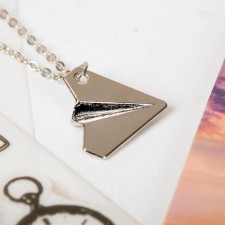The pendant “Dreams allow you to fly” a paper plane, the color of silver, 40 cm