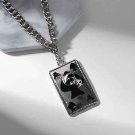 Pendant "map with a skull", black color in silver, l = 60 cm