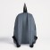 A backpack with a zipper, "saxi", outer pocket, dark gray color