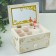 Musical mechanical musical "White chest of drawers with a golden pattern" 15.5x10.7x8.5 cm