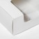 The box is folding, under 3 eclairs, white, 15 x 15 x 5 cm