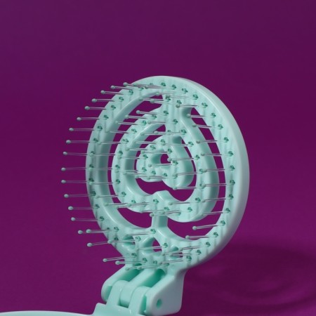 The comb is massage, folding, with a mirror, d = 6.6 cm, green color-5