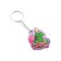 A keychain "Happy New Year!" symbol of the year, Christmas tree