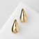 Earrings plastic "drop" curved van, color gold