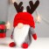 Interior doll "Santa Claus in a red hat with horns" 20x13x11 cm