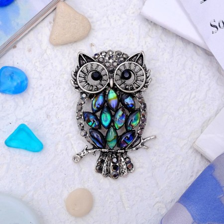 Galiotis brooch-column owl night, green color in black silver