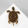 Brooch "Turtle" with a tail, color emerald in black gold