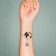 Tattoo on the body Black "Ball with a suitcase" 6x6 cm