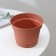 Pot for flowers with a pallet min, 1.2 l, d = 15 cm, h = 11.3 cm, terracotta color