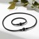 Set 2 objects: chocker, lava bracelet rubber, black color