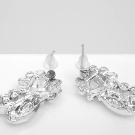 Earrings with rhinestones "flowers" bends, white color in silver-2