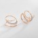 Earrings with rhinestones Xuping Creation Spiral, white color in pink gold