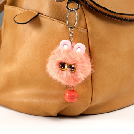 Fluffy on the ring "Star eyes with a bell" peach 8.5x6x6 cm