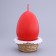Decorative candle "Easter egg in a basket"