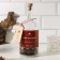 A set of herbs and spices for the preparation of tincture "Cherry on cognac" with a bottle